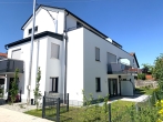 Neubau: Sonnige Gartenwohnung mit Terrasse und Südgarten in ruhiger, sehr guter Lage in Karlsfeld - Hausansicht